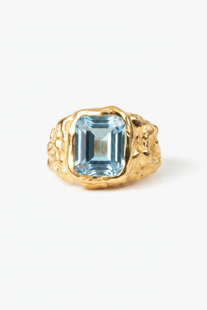 Anillo oro vermeil con topacio azul